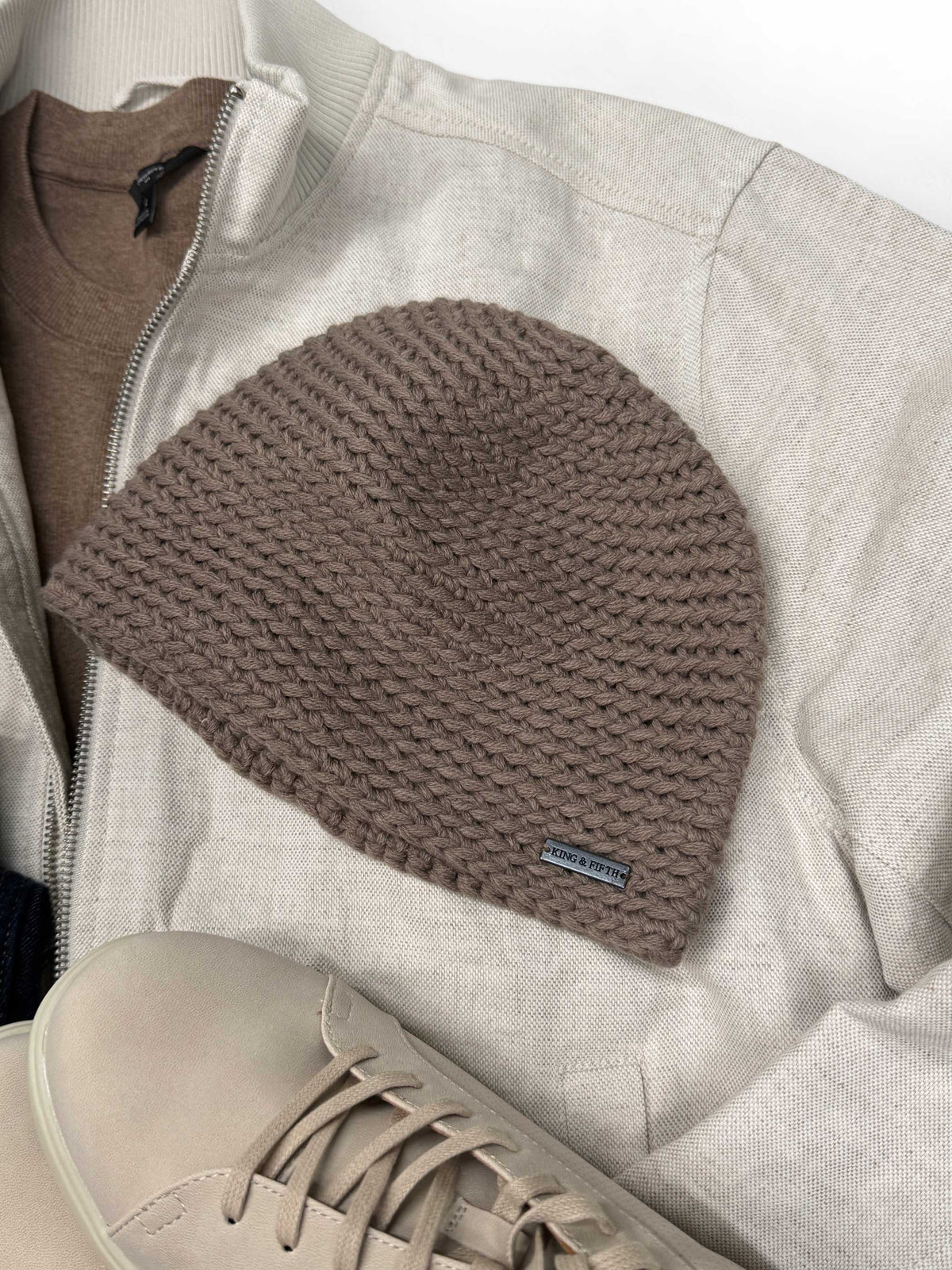 beige skull cap beanie